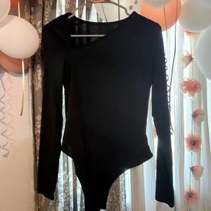 One piece body suit, never worn
